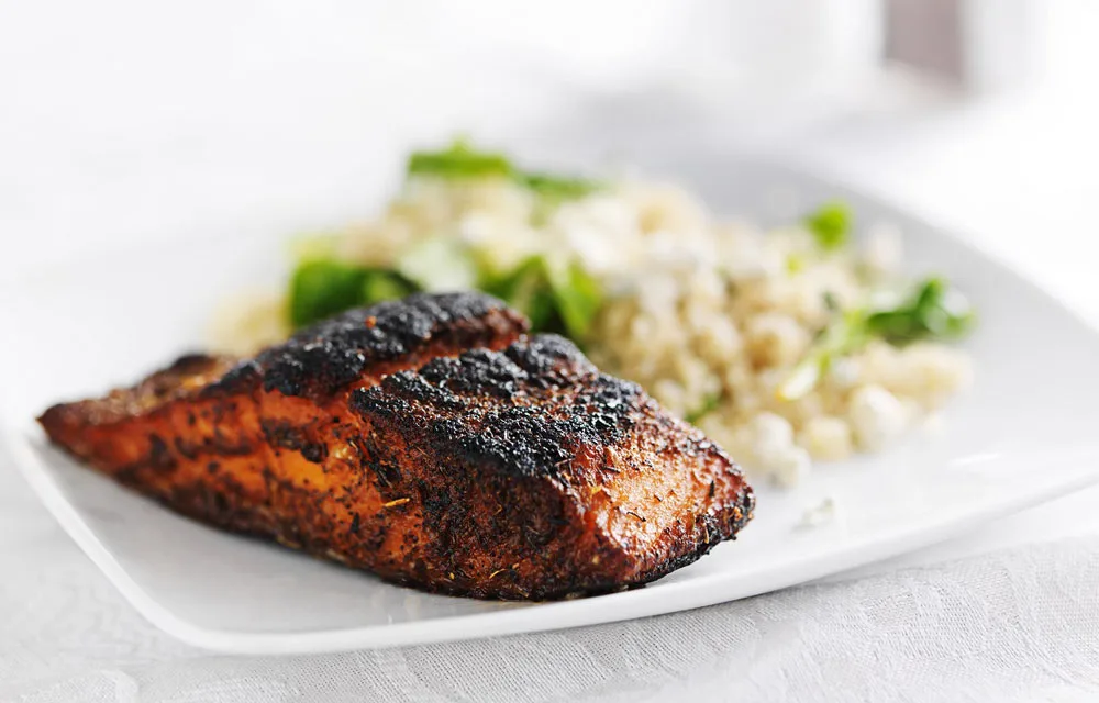 Asian inspired baked salmon with quinoa and vegetables