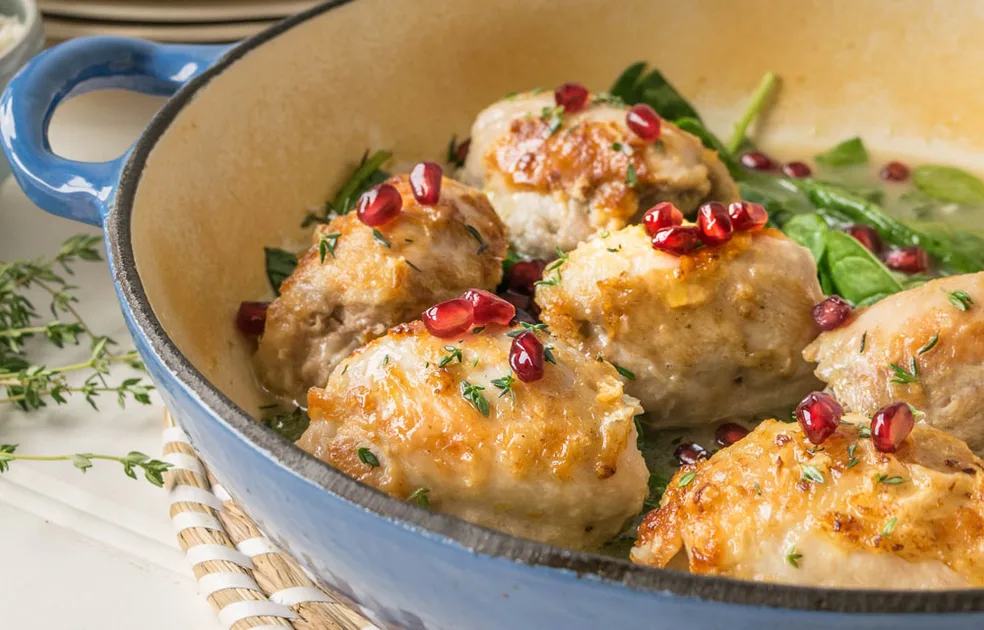 Roast chicken with pomegranate and spinach - Better Homes & Gardens Australia