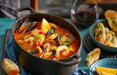 Seafood soup with herb and garlic toasties