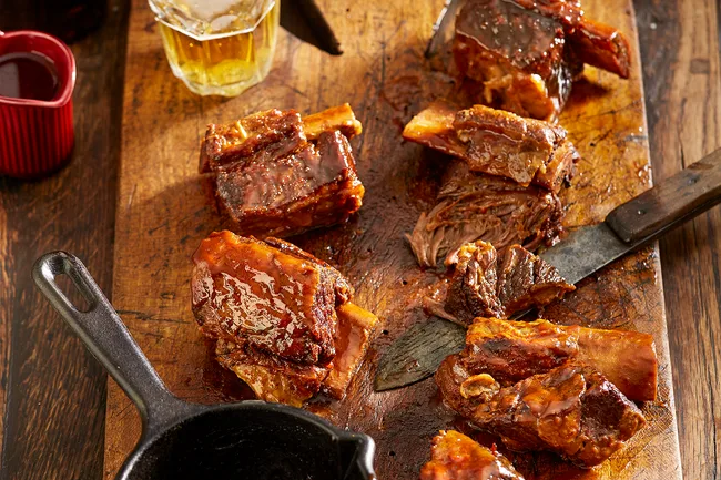 beef ribs on wooden tray