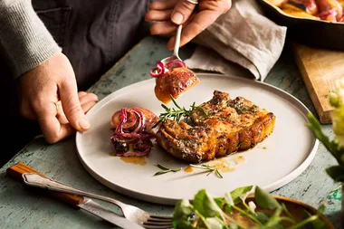 Seared pork chops with baked apple and cherry relish