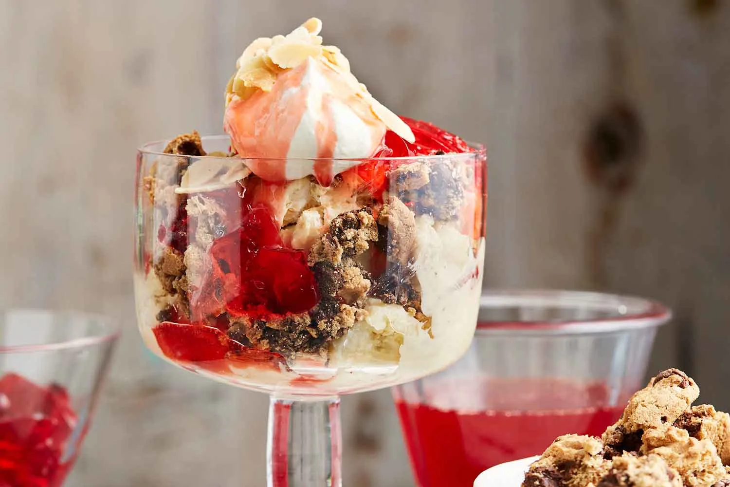 Salted caramel ice-cream sundae with roast banana and strawberry sauce