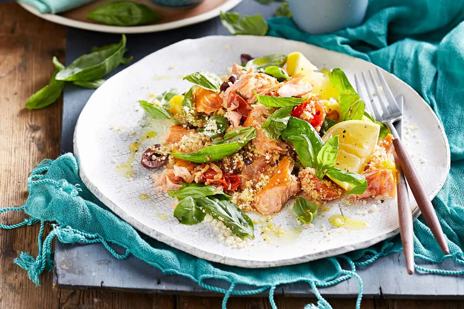 Handmade couscous with smoked trout olives and basil