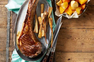Tomahawk steak with candied onion and brandy gravy