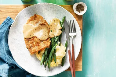 Chicken fried streak with cheese gravy