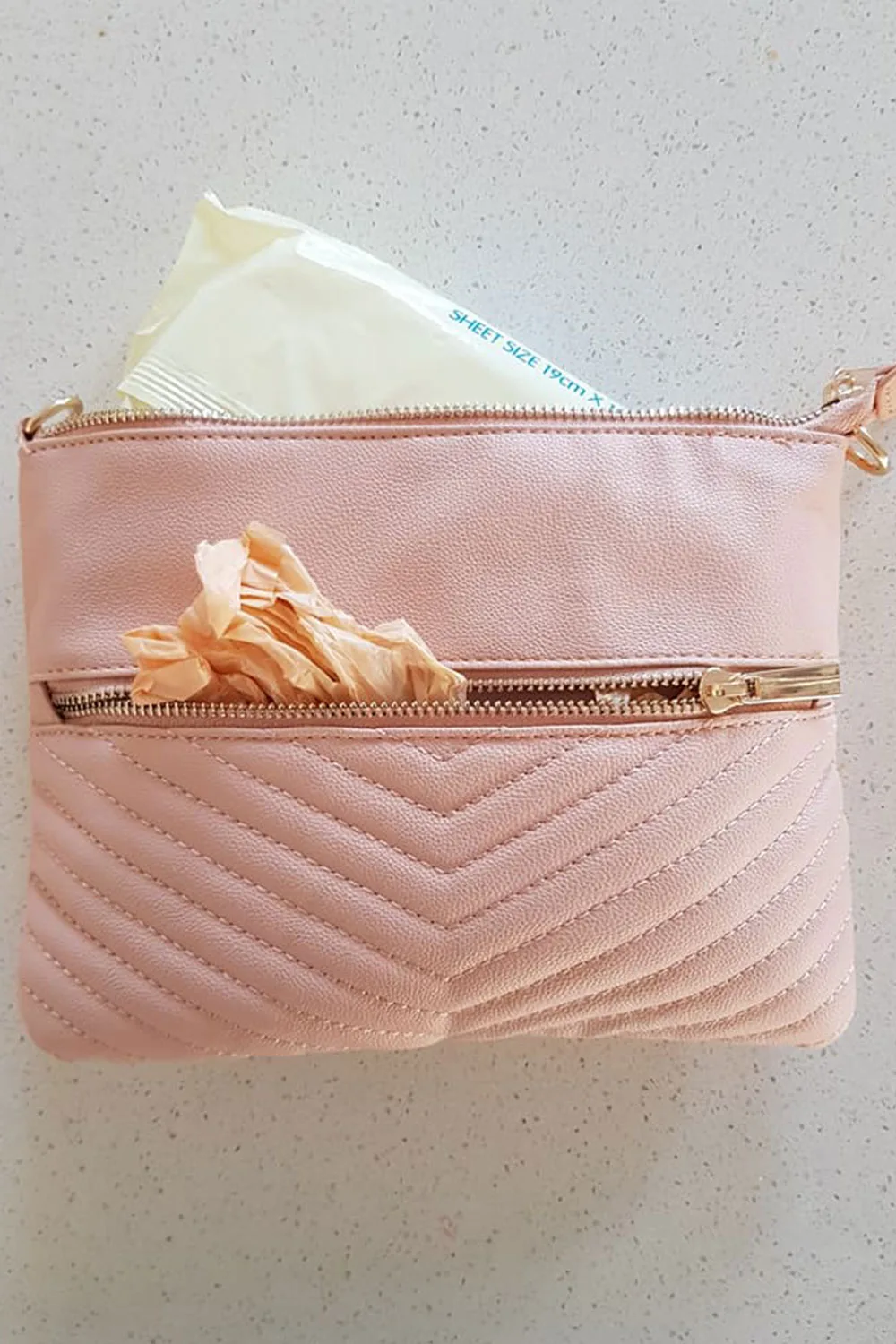 Nappy bag hack Kmart mum s genius clutch transformation Better Homes and Gardens