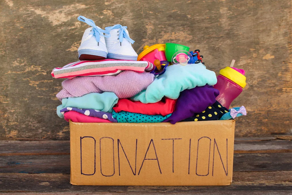 Box of clothes for charity donation.