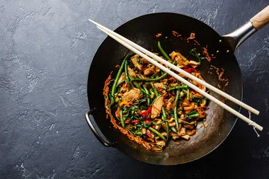 How to make a cast-iron wok non-stick