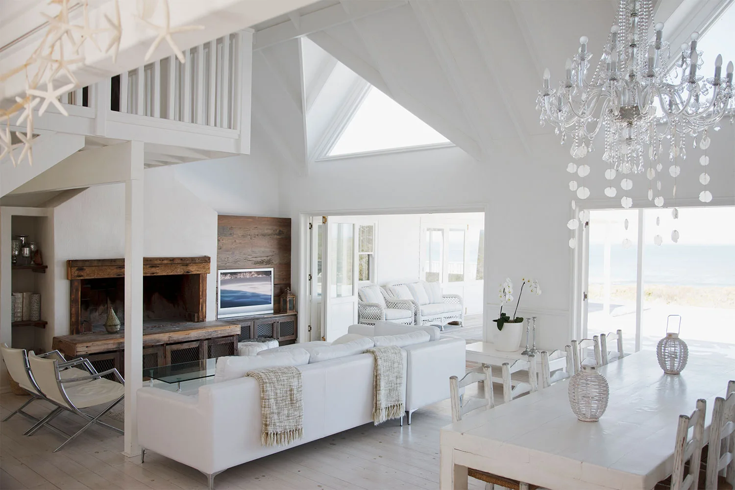 White living room with chandelier