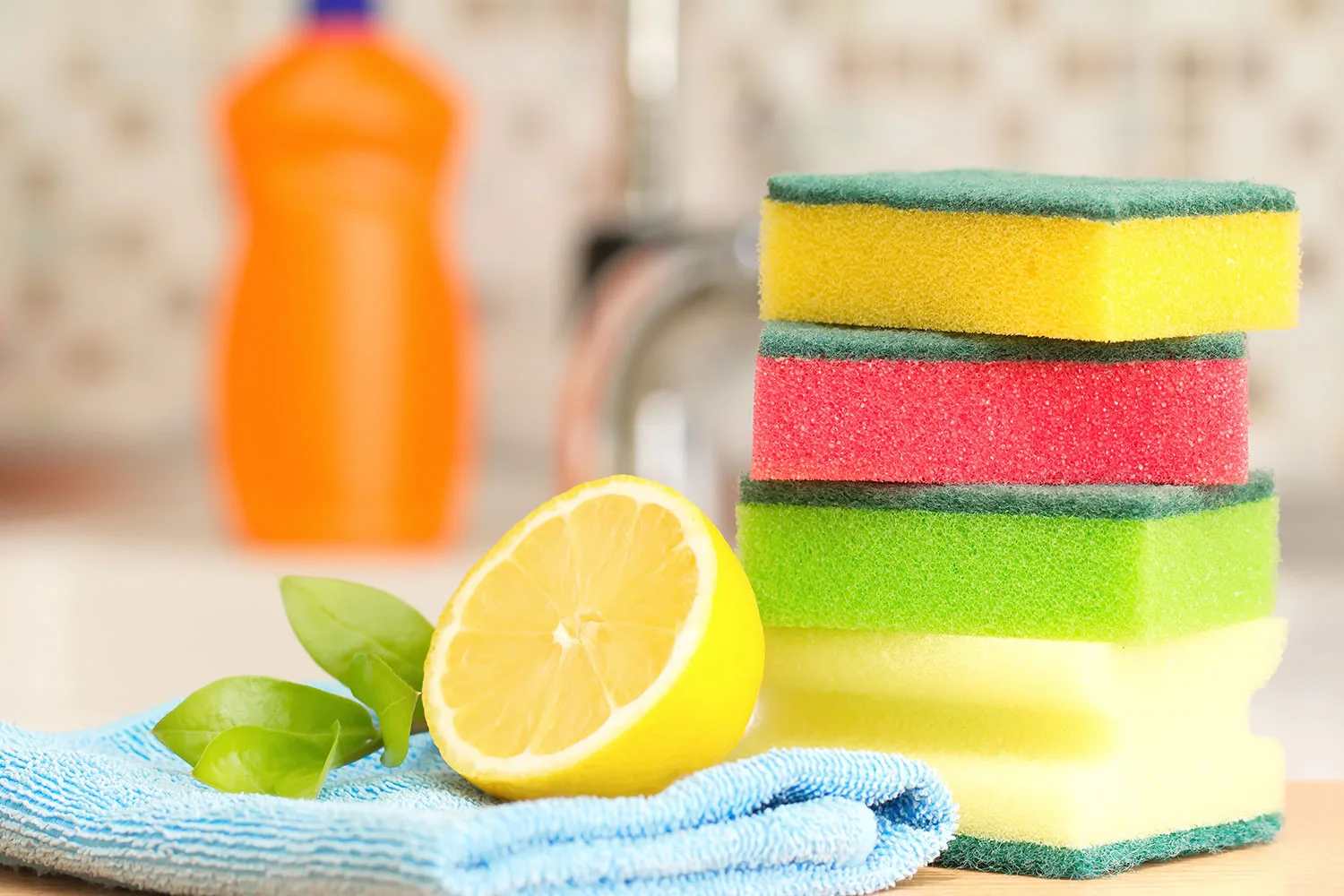 Lemon with cleaning sponges
