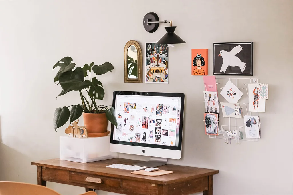 Desk organised with plants and notes