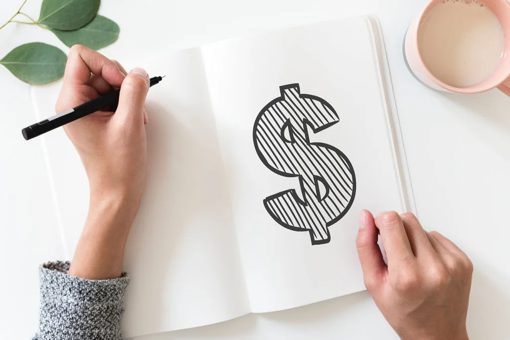 dollar drawing in notebook