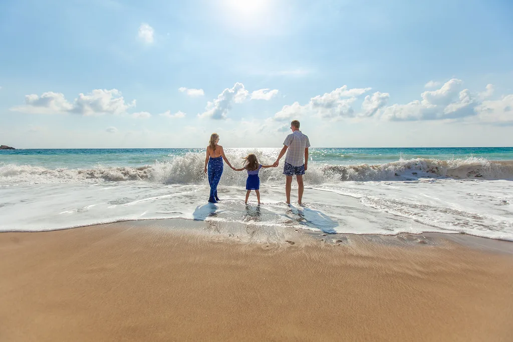 family at the beach holiday