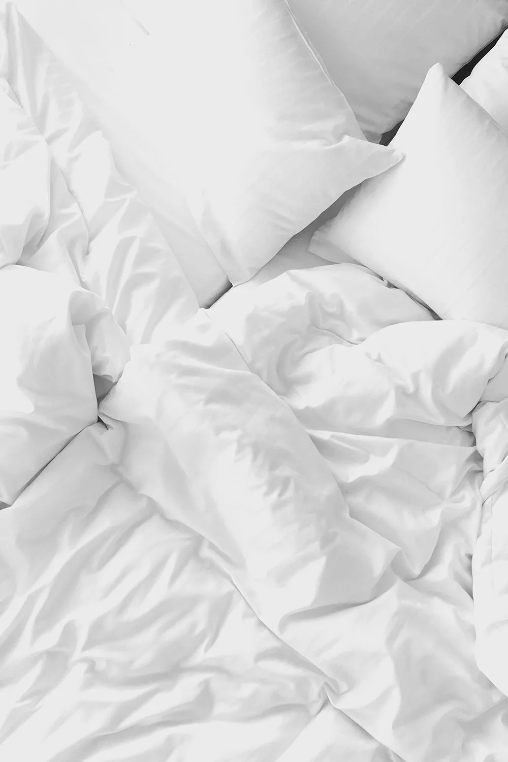white bedding linen