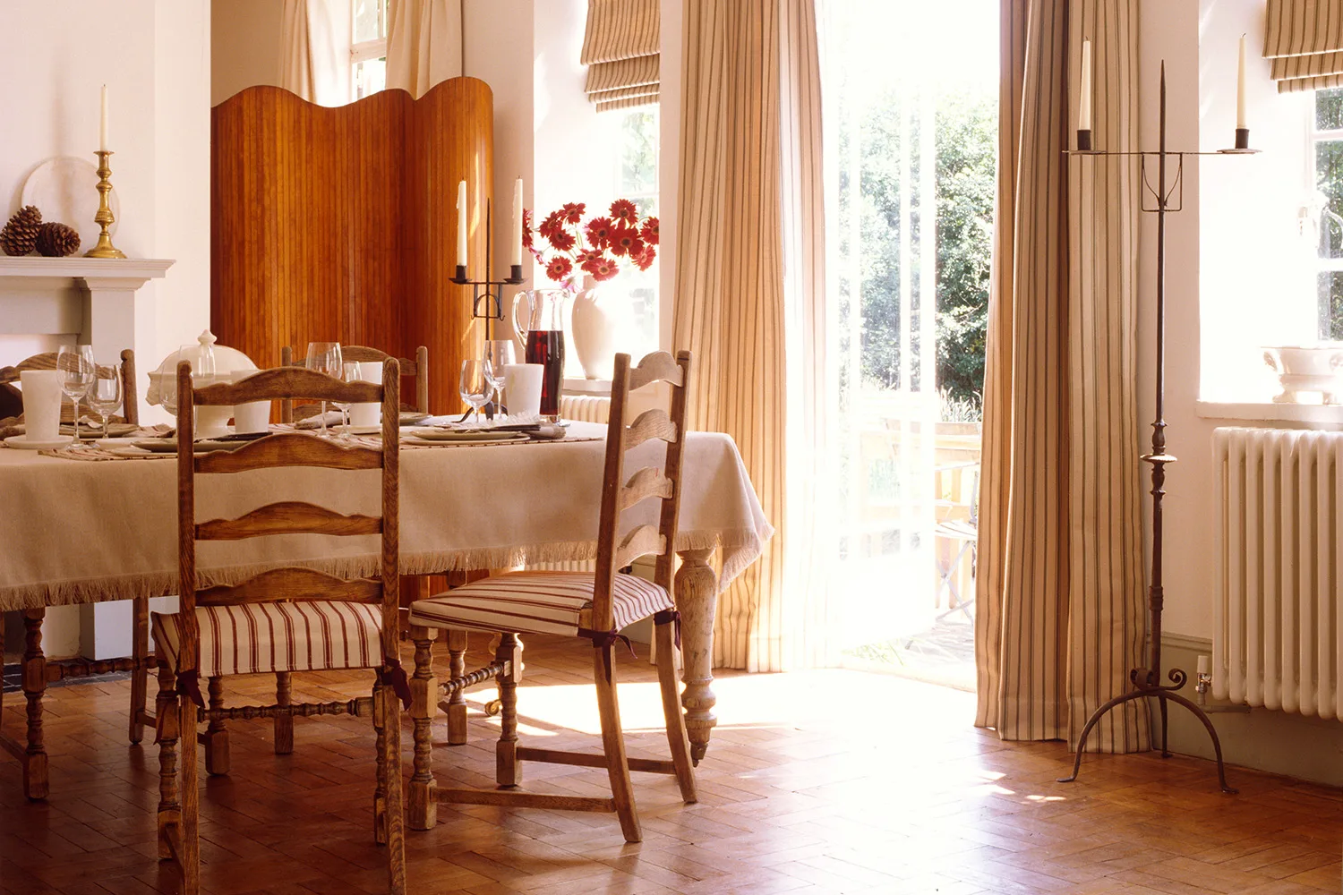 Country style dining room with warm-toned timber