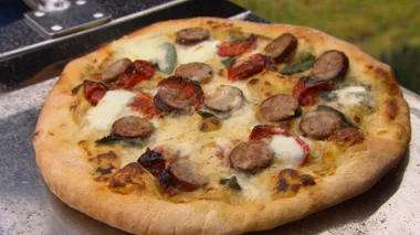 Garlic-mushroom pizza with roasted kransky & sage