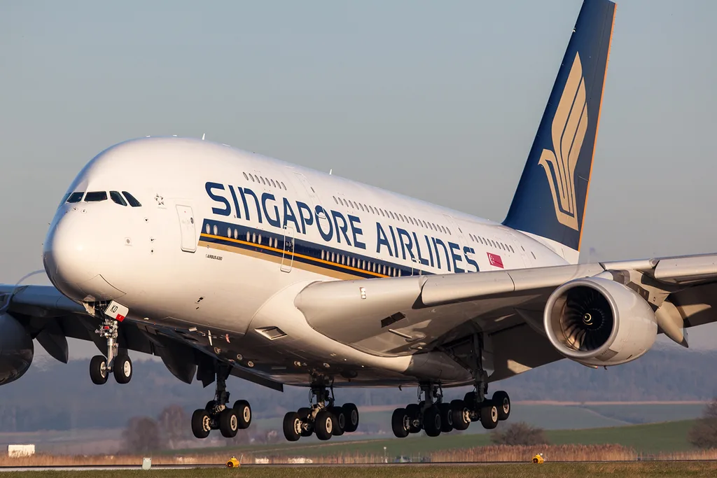 Singapore Airlines plane landing on runway