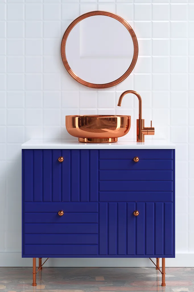 blue cabinetry for white bathroom copper fixtures