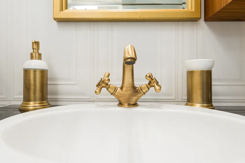 gold taps in bathroom