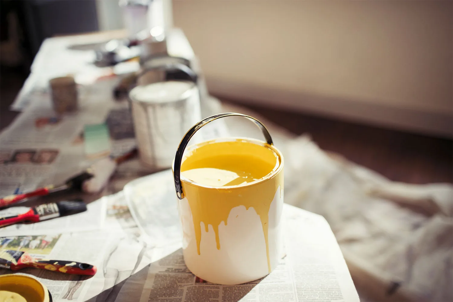 Can of yellow paint