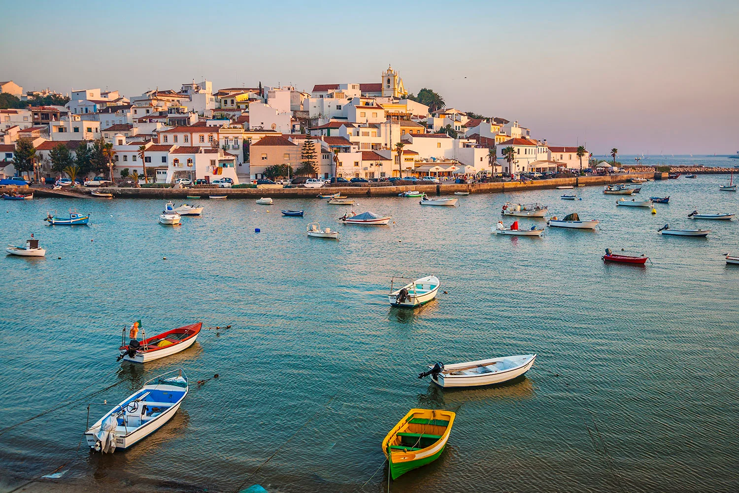city by the sea boats on water