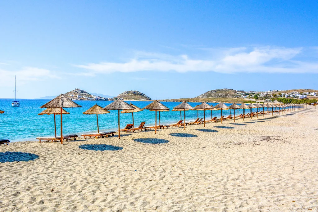 umbrella on beach with loungers