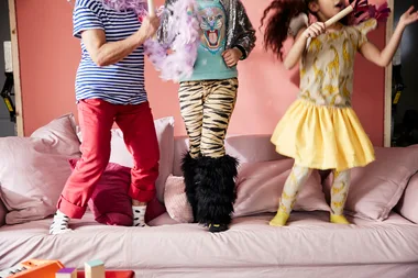 kids jumping on couch