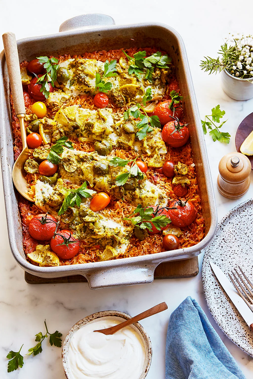roasted fish with pilaf and whole roasted cherry tomatoes