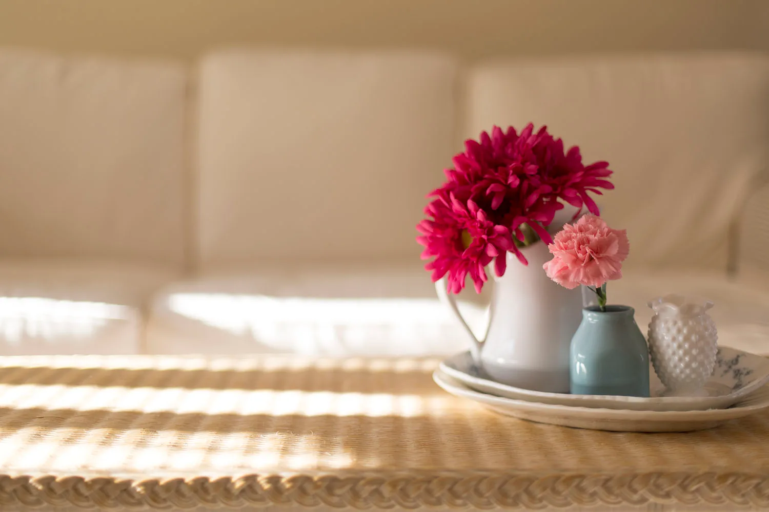 plates and vases on coffee table