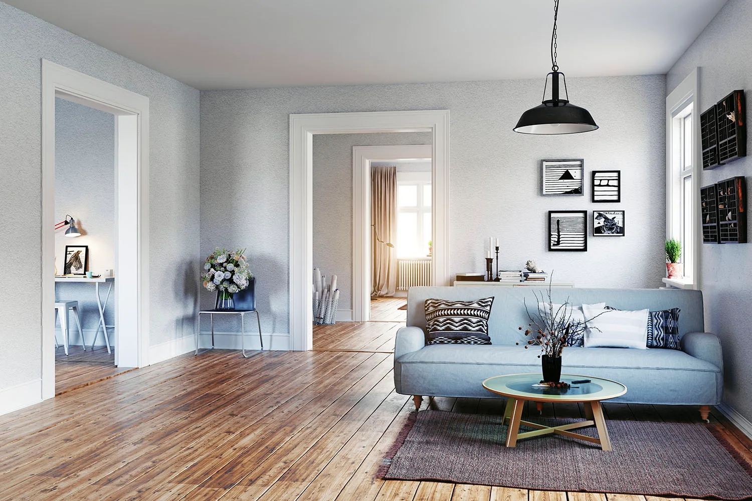 white room blue sofa art on wall timber floors