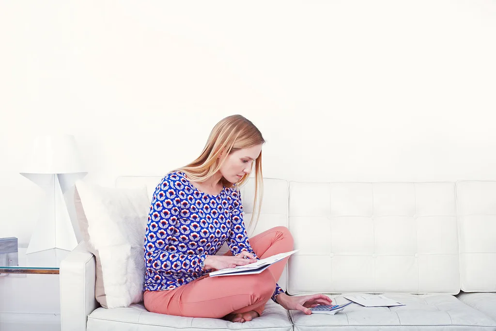 young woman working on laptop