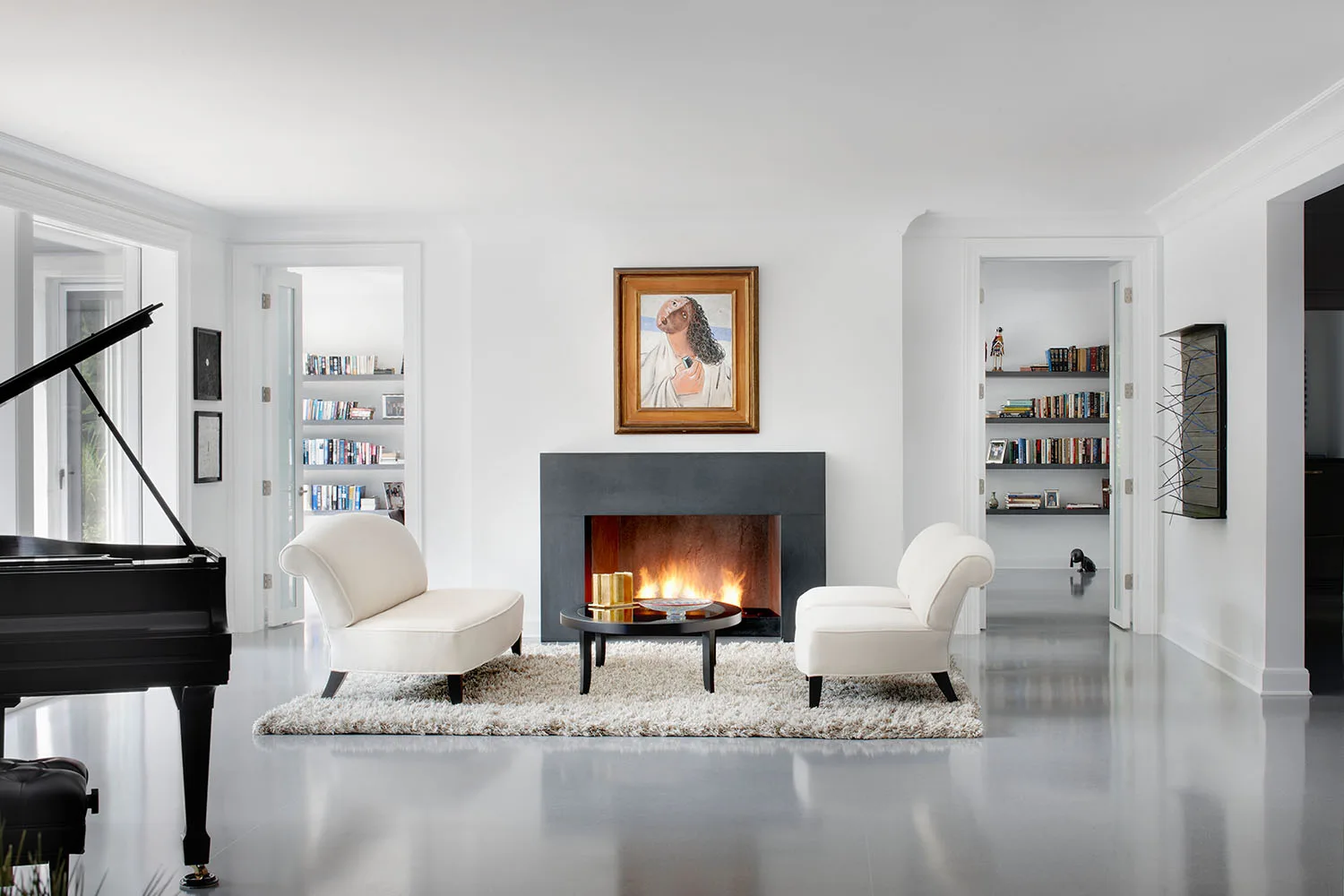 art hanging above fireplace in living room