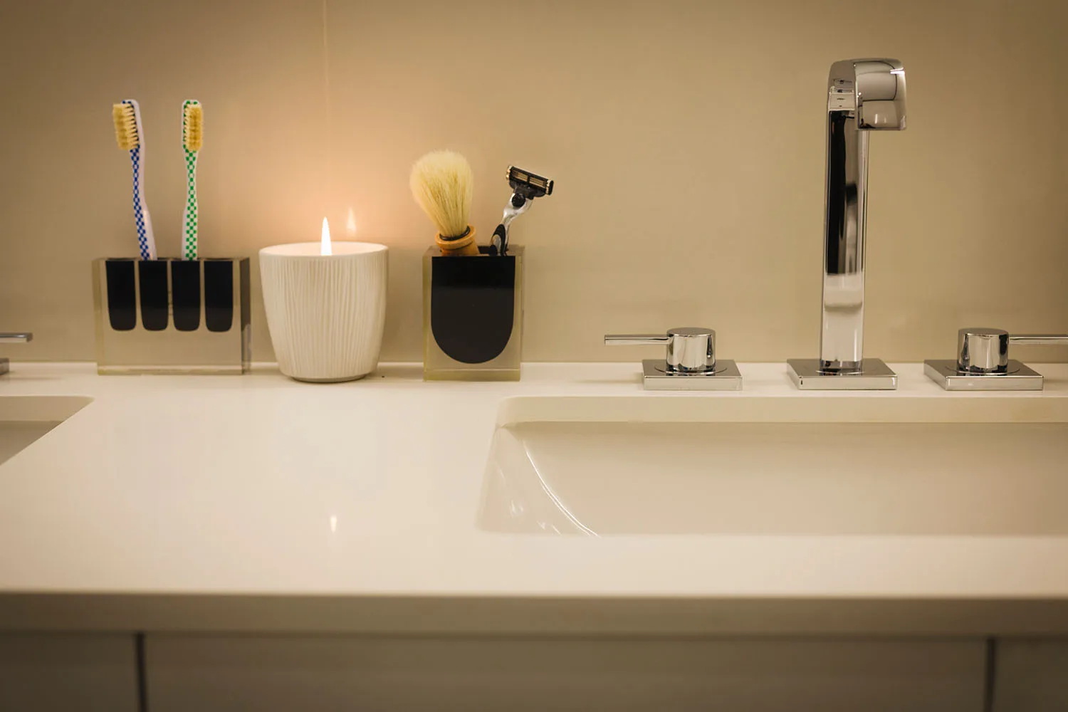 bathroom vanity with burning candle