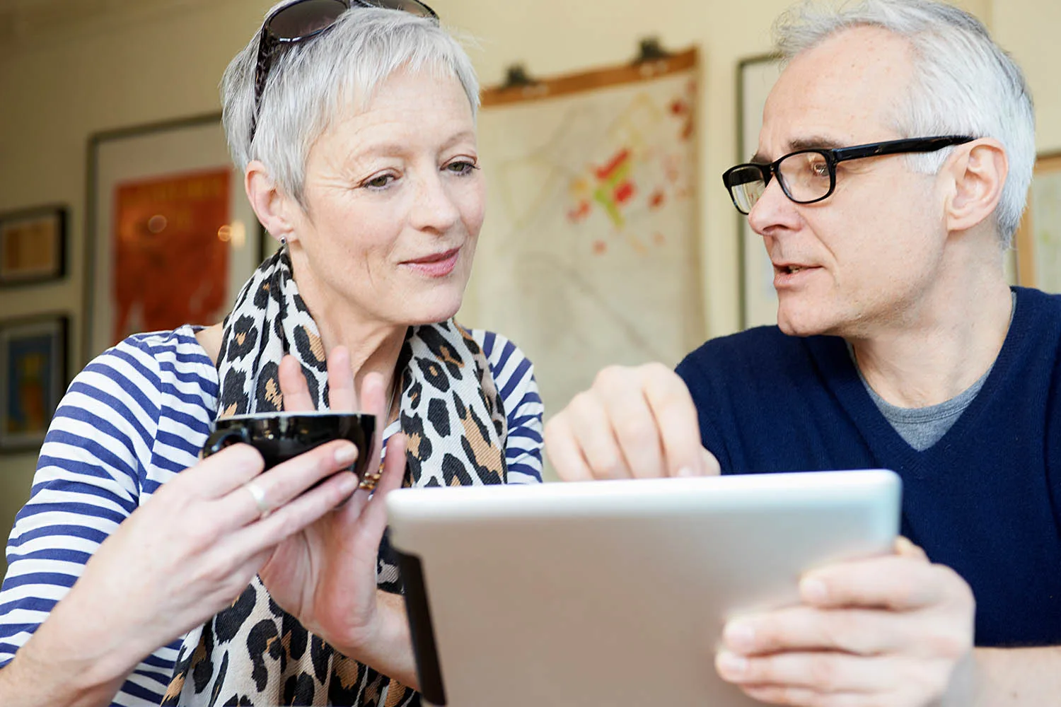 couple looking at ipad