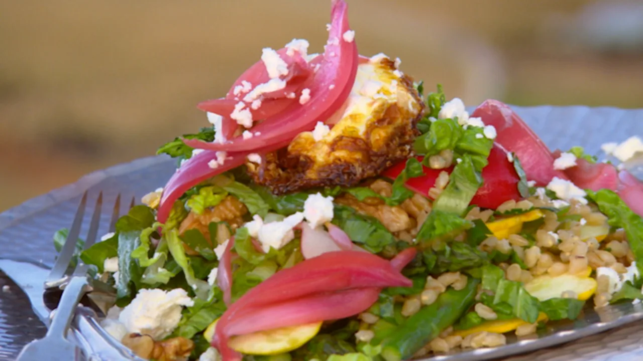 Asparagus walnut squash goats cheese salad with deep fried egg