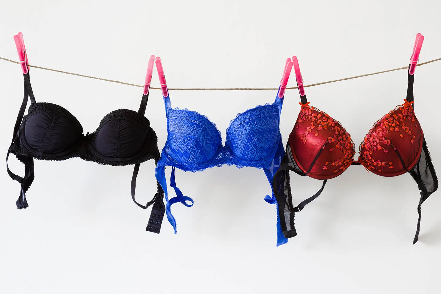 bras hanging on washing line
