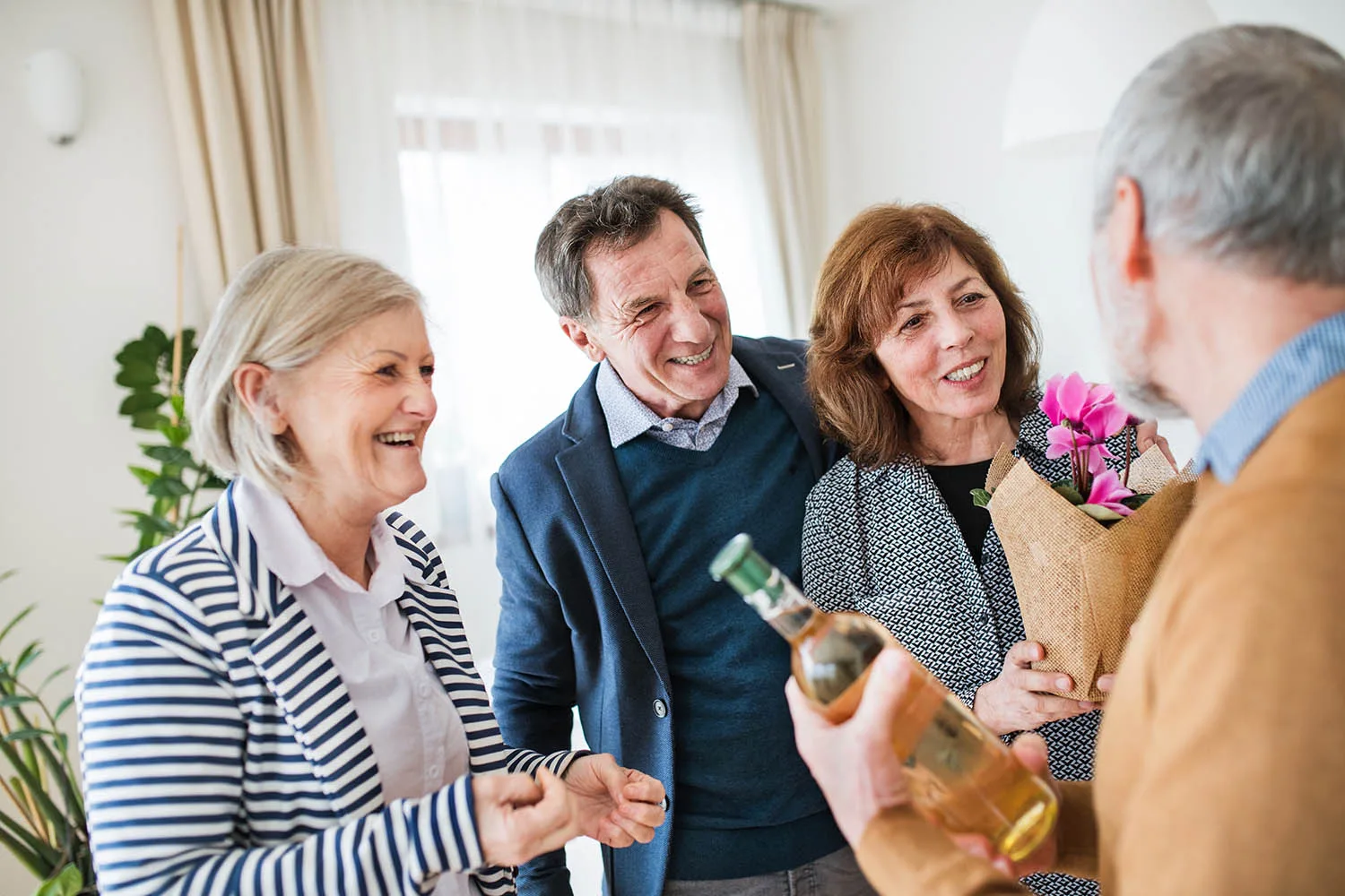 guests with wine and flowers