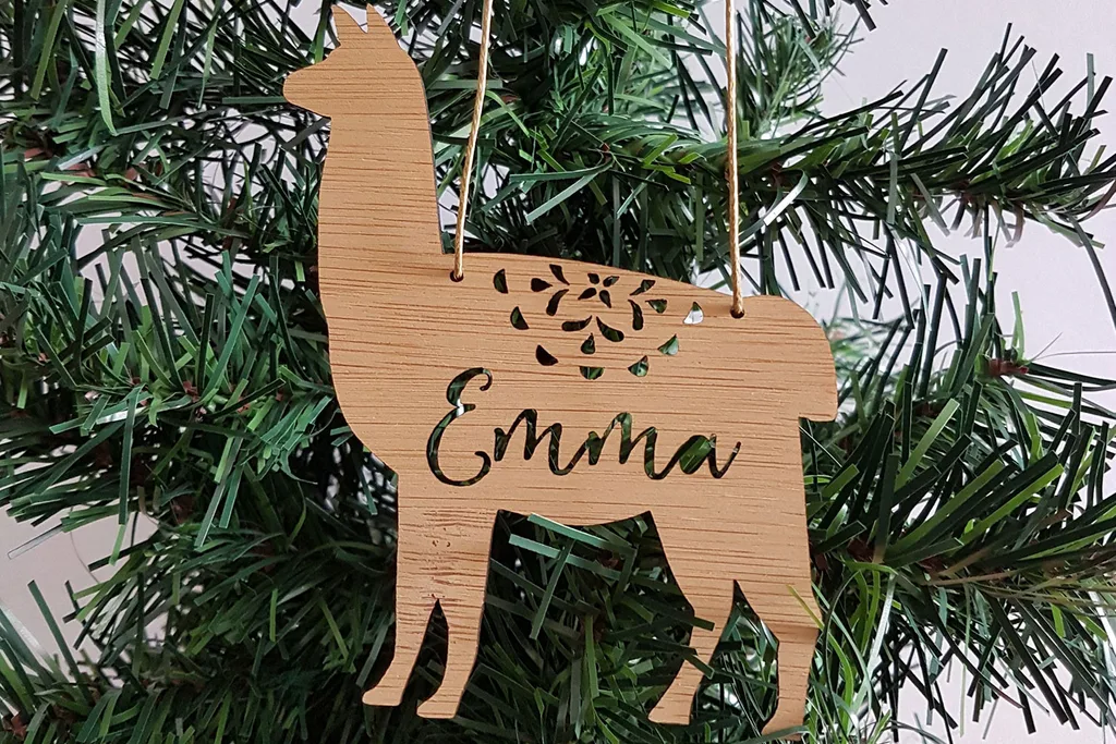 Llama Christmas decoration with Emma on it