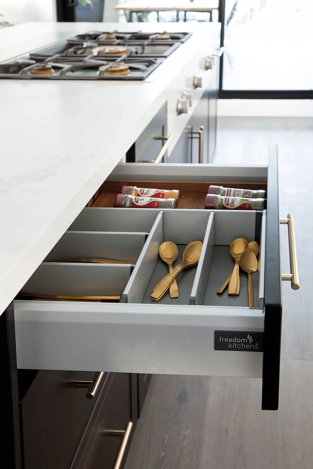 bench in kitchen with open drawer