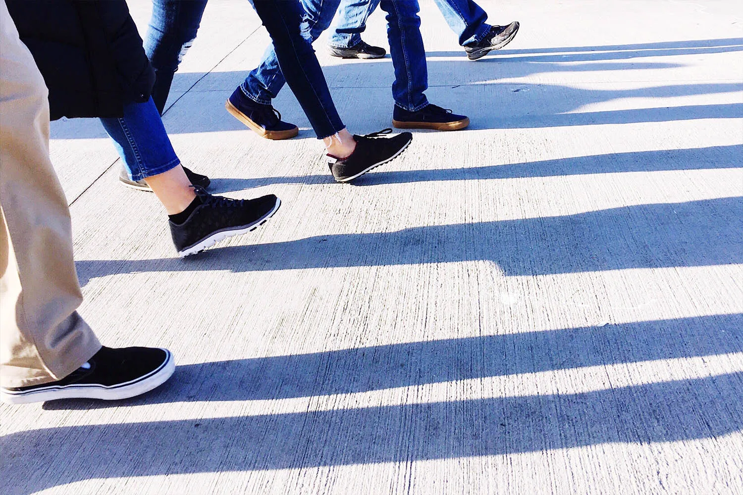 feet wearing sneakers