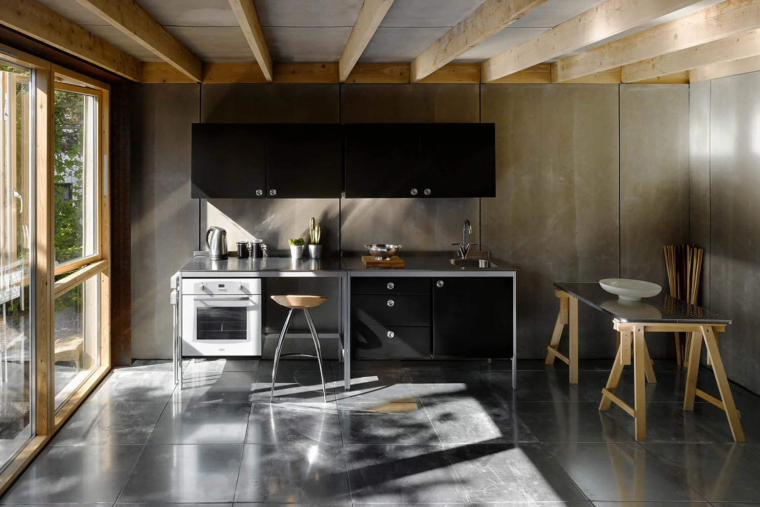 Kitchen with dark colour scheme