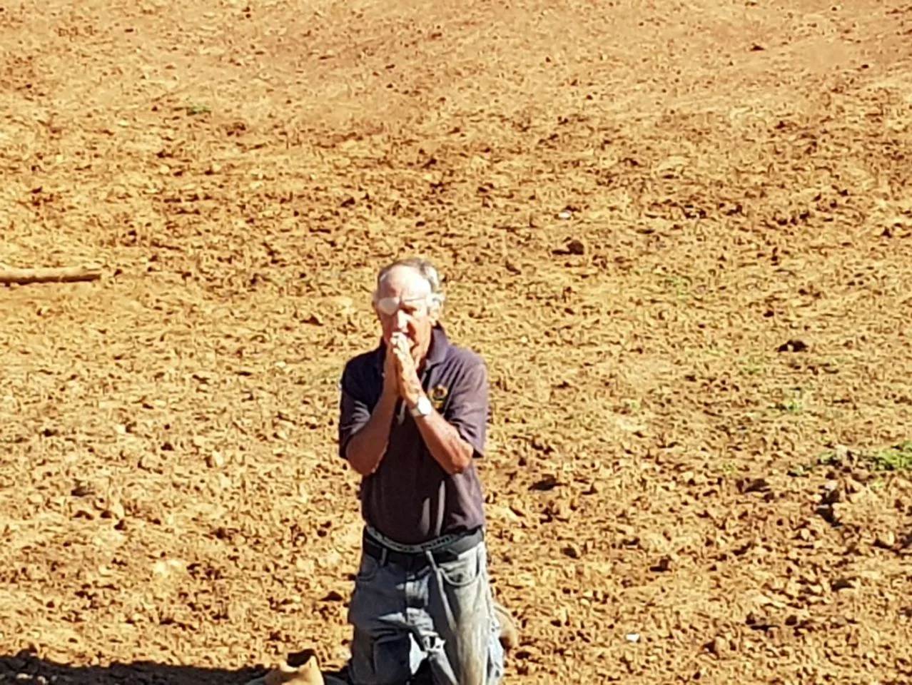 This photo of a desperate farmer shows exactly how devastating the drought is