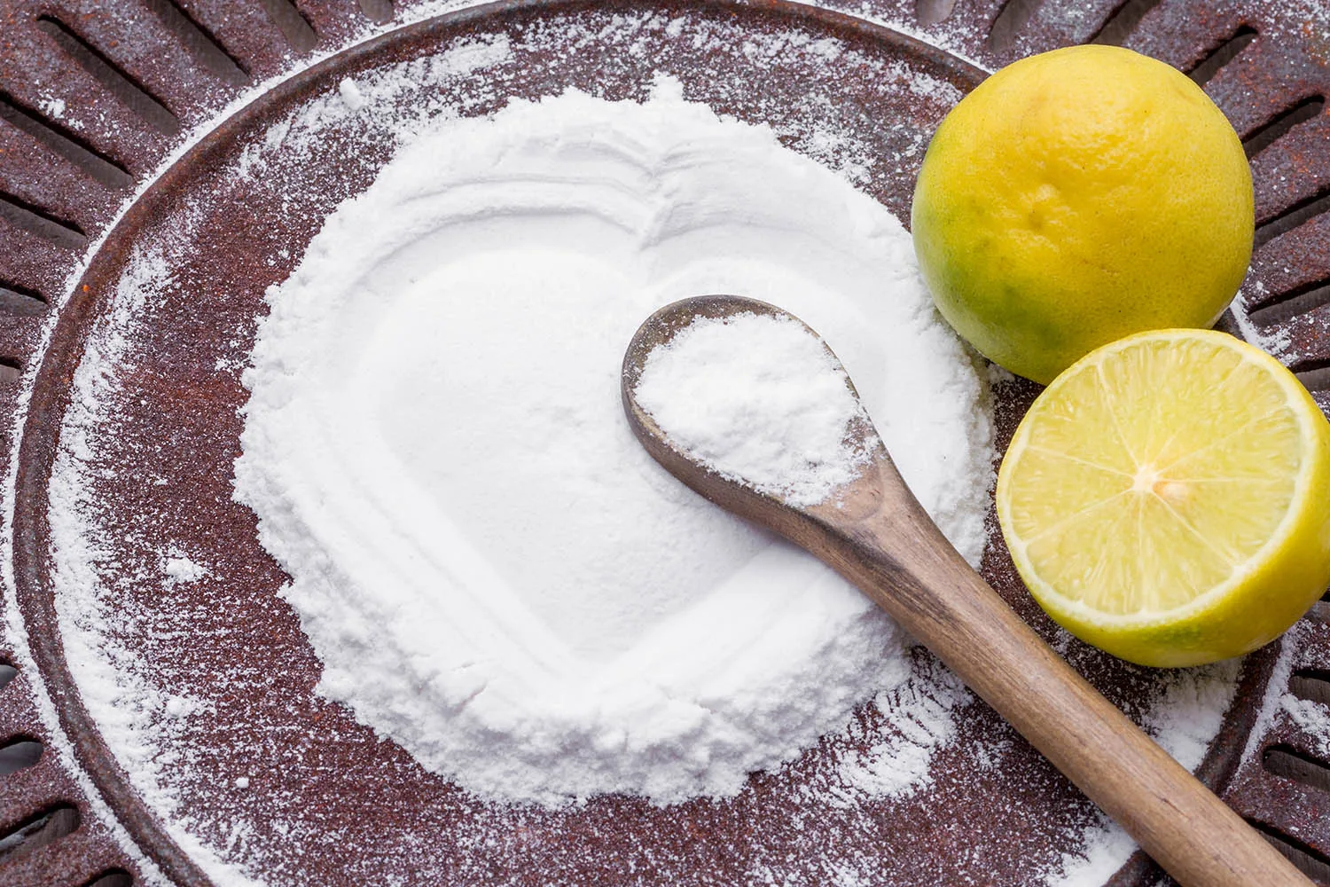bi-carb soda and lemon cut in half