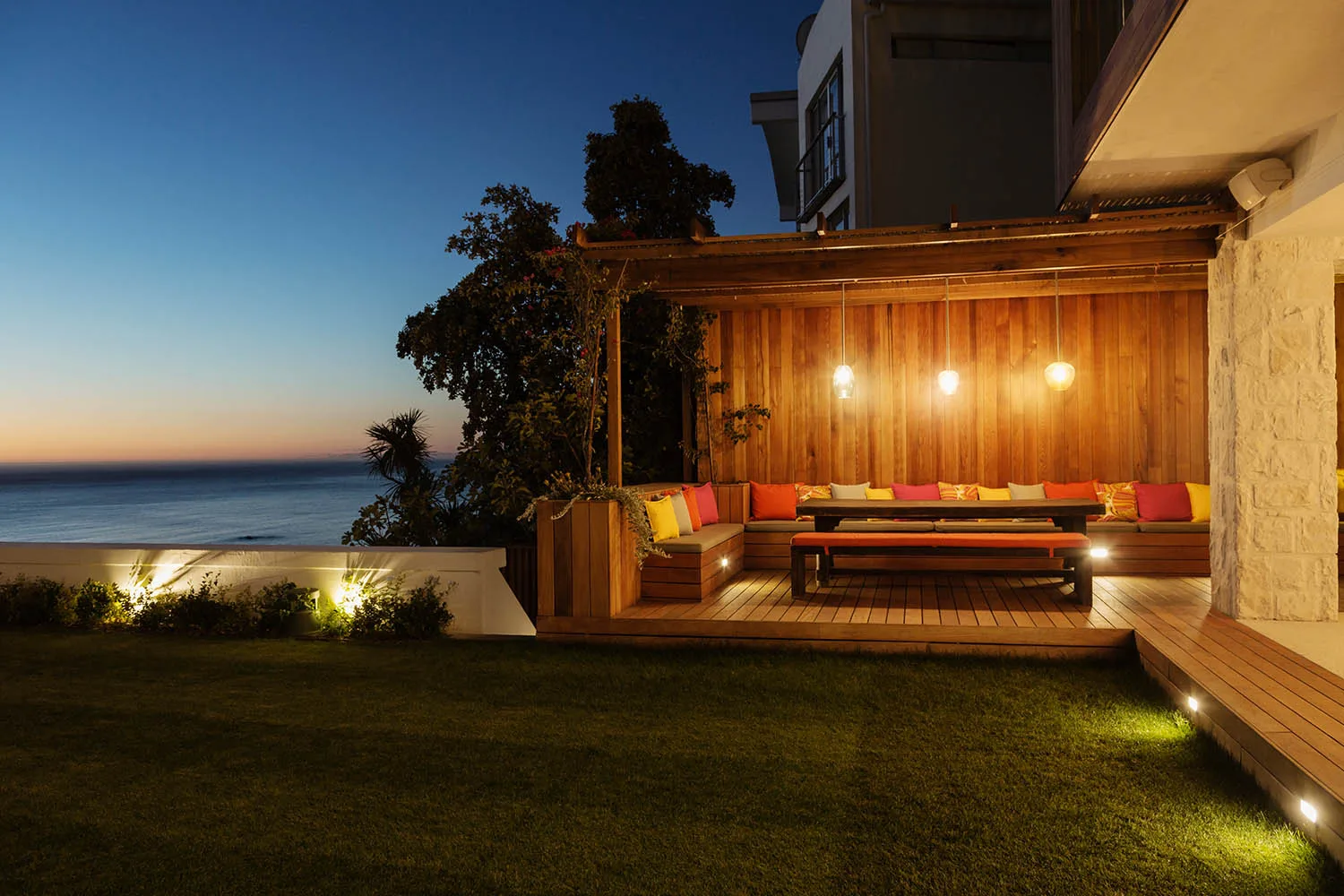 small space deck in corner of garden