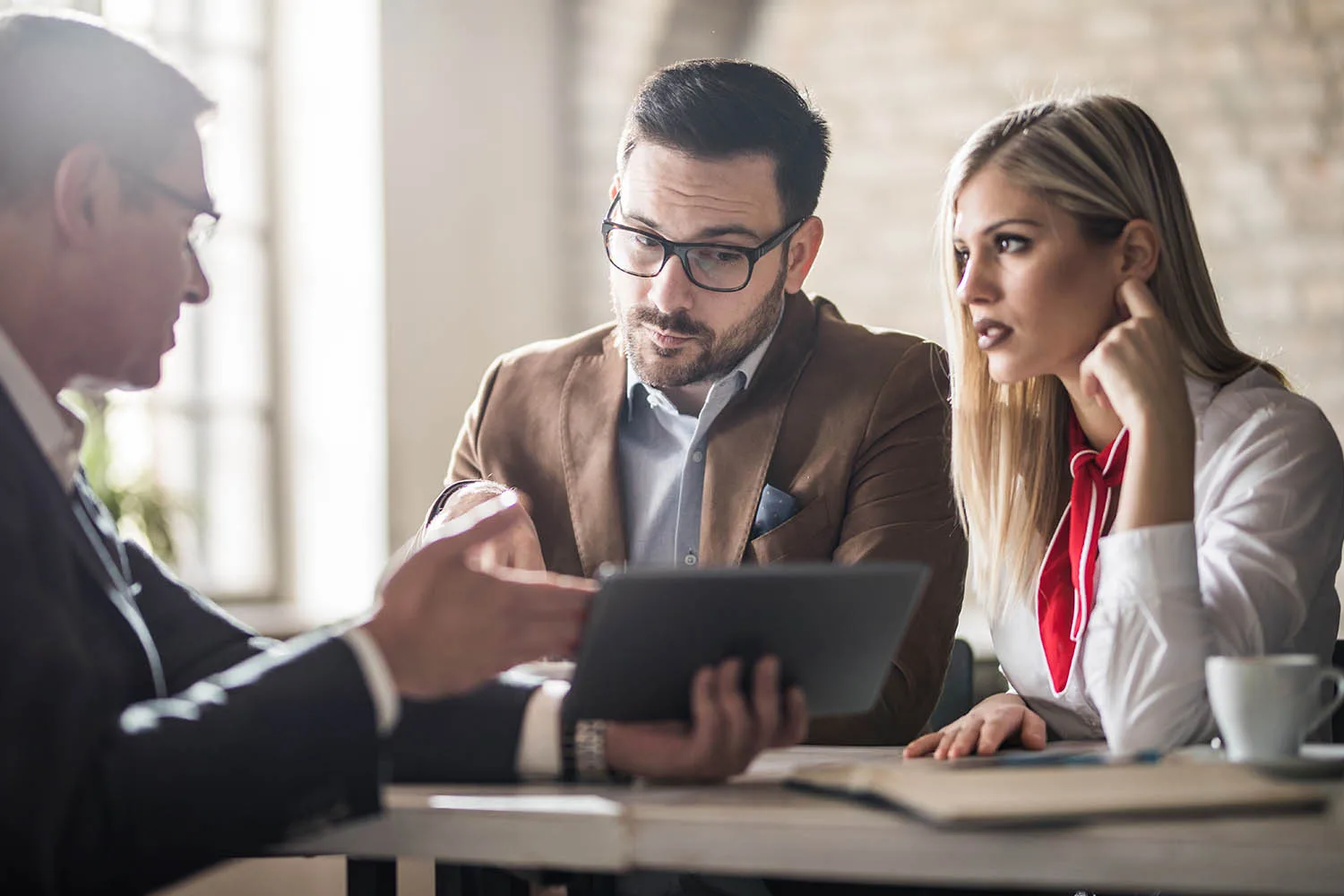 people talking with financial advisor