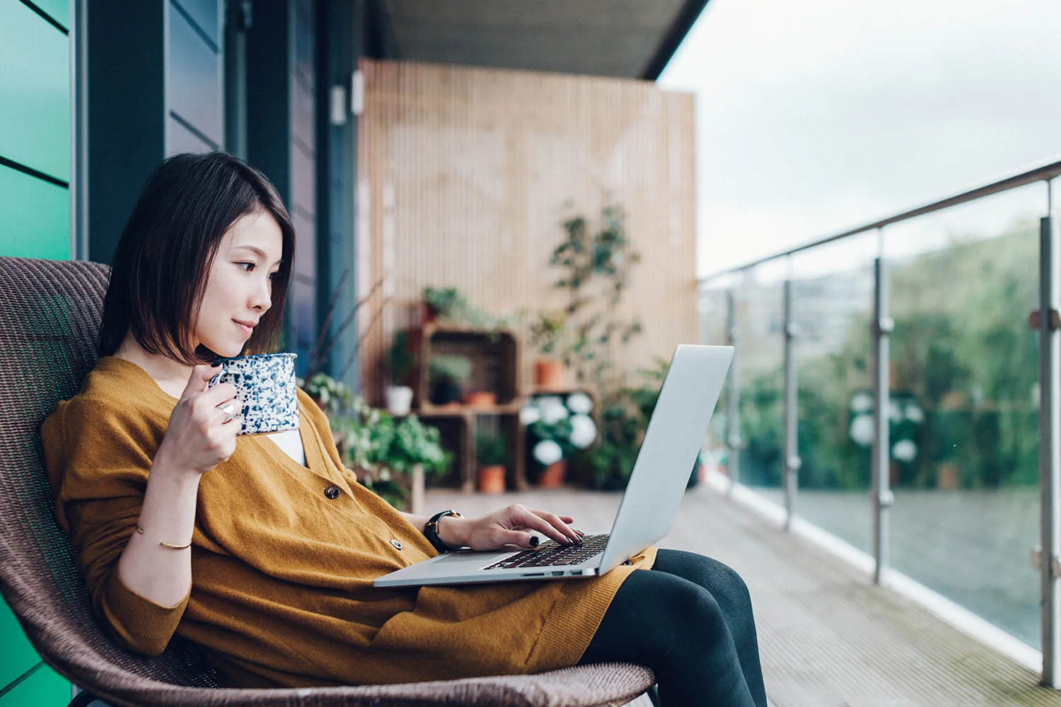 woman looking at laptop