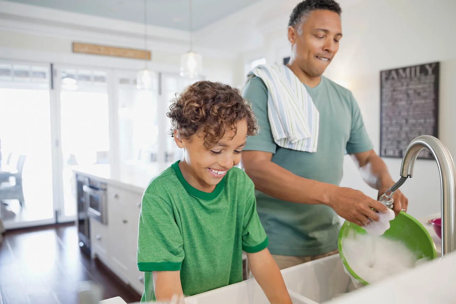 man and son washing up