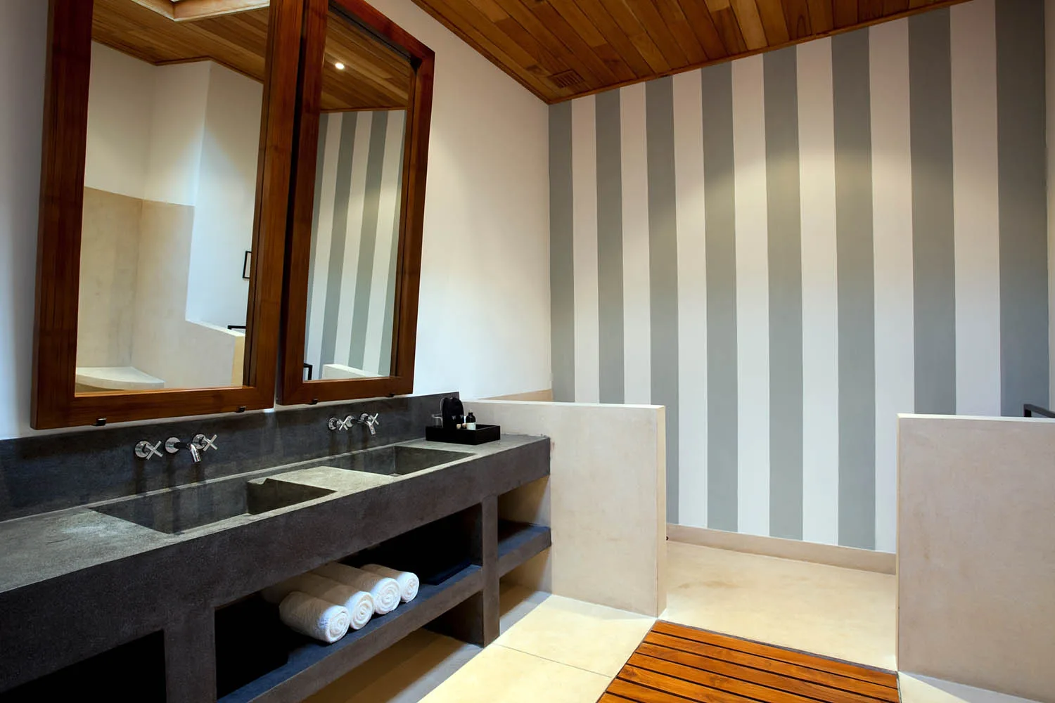 bathroom made from timber, concrete and natural stone