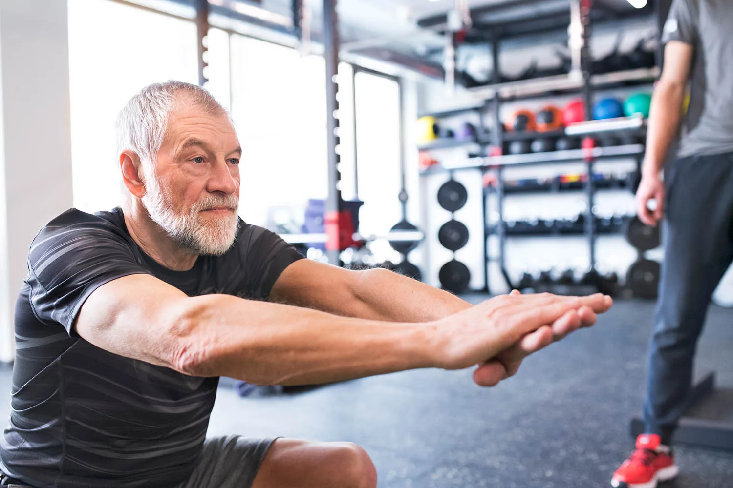 man older than 40 stretching