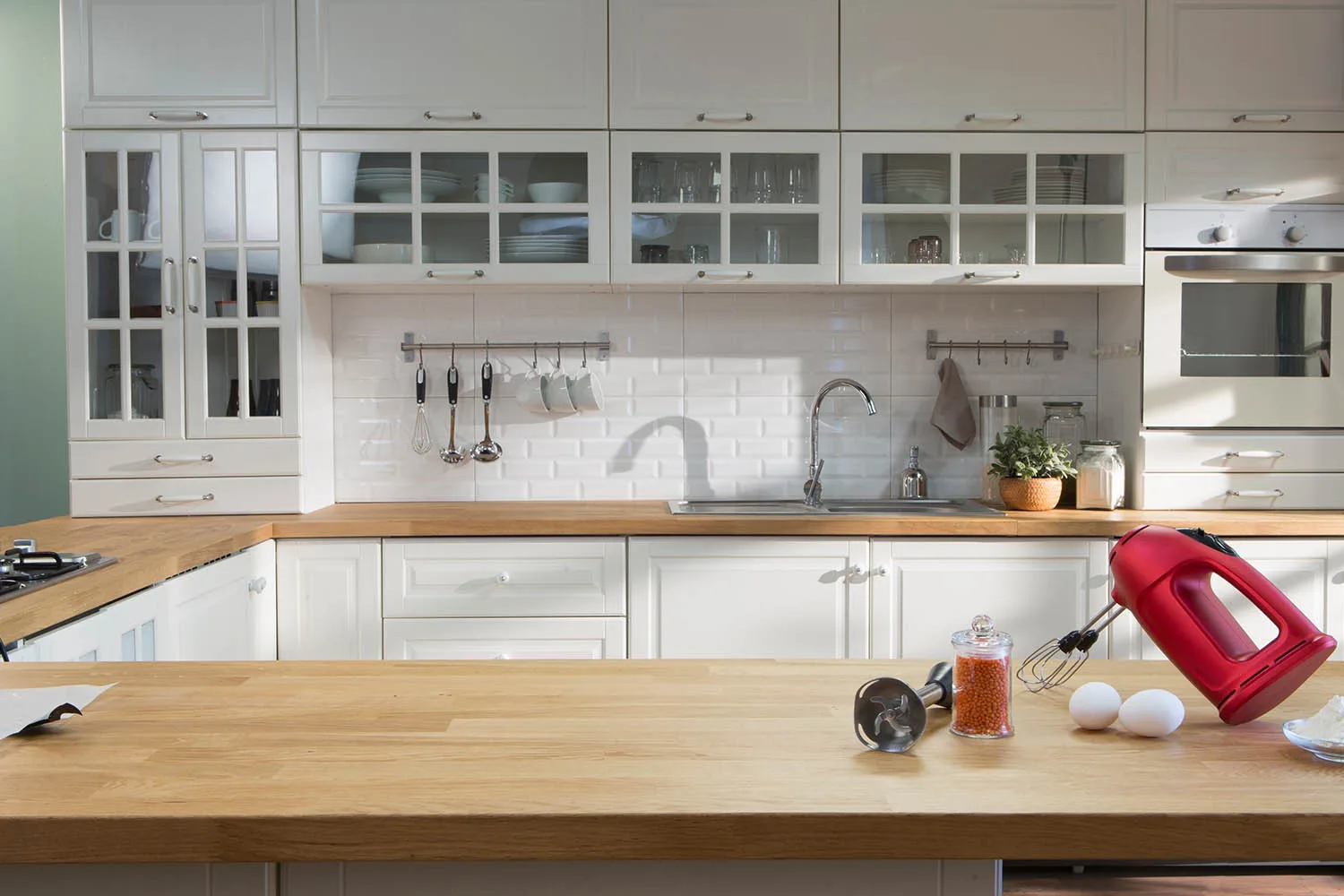 country style kitchen in white with timber benchtop